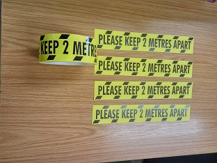 Yellow & Black 'Keep 2 Meters Apart' Tape